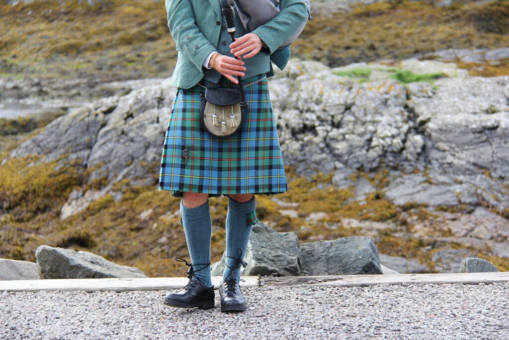 man holding bagpipes